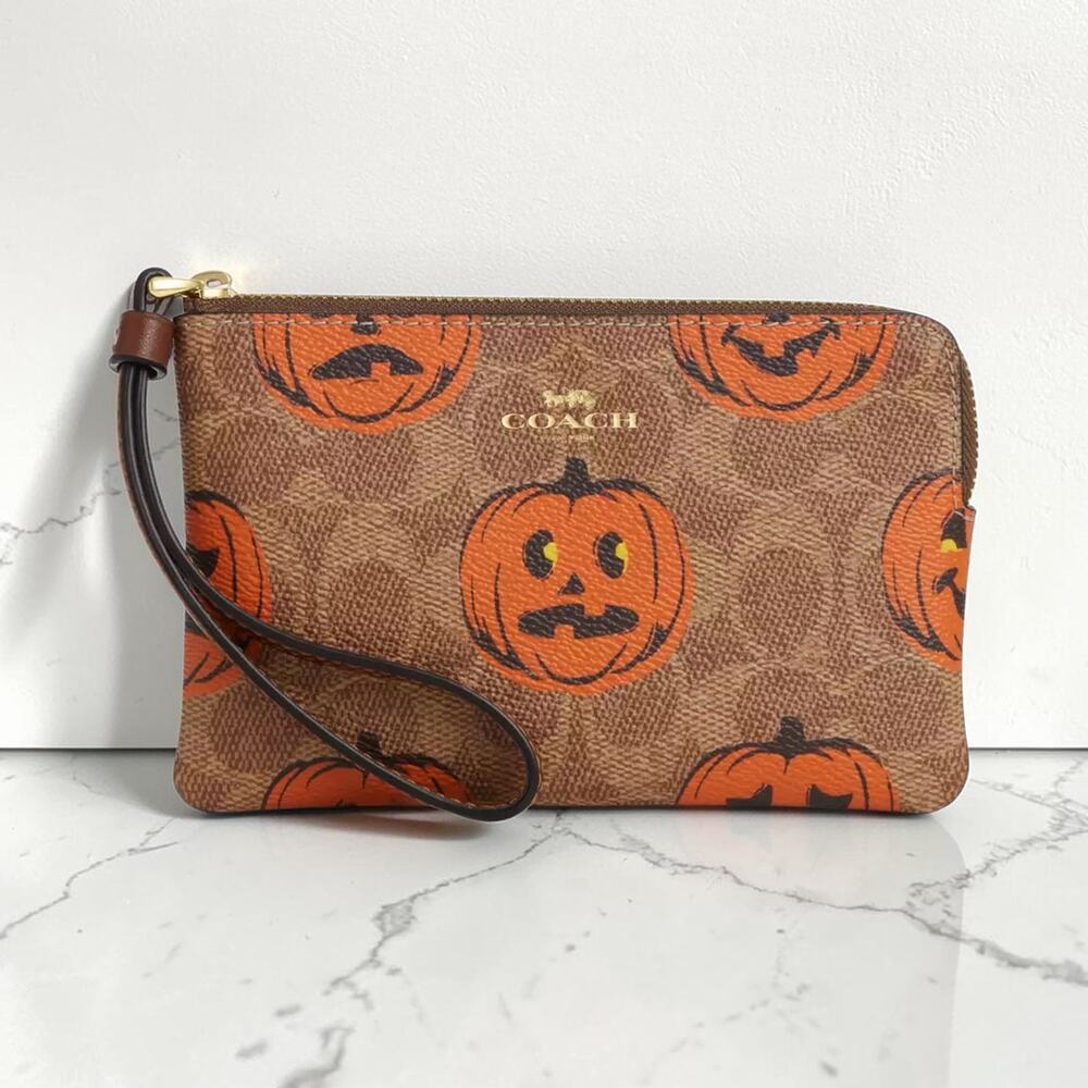 Coach Corner Zip Wristlet In Signature Canvas With Halloween Pumpkin Print CCL20